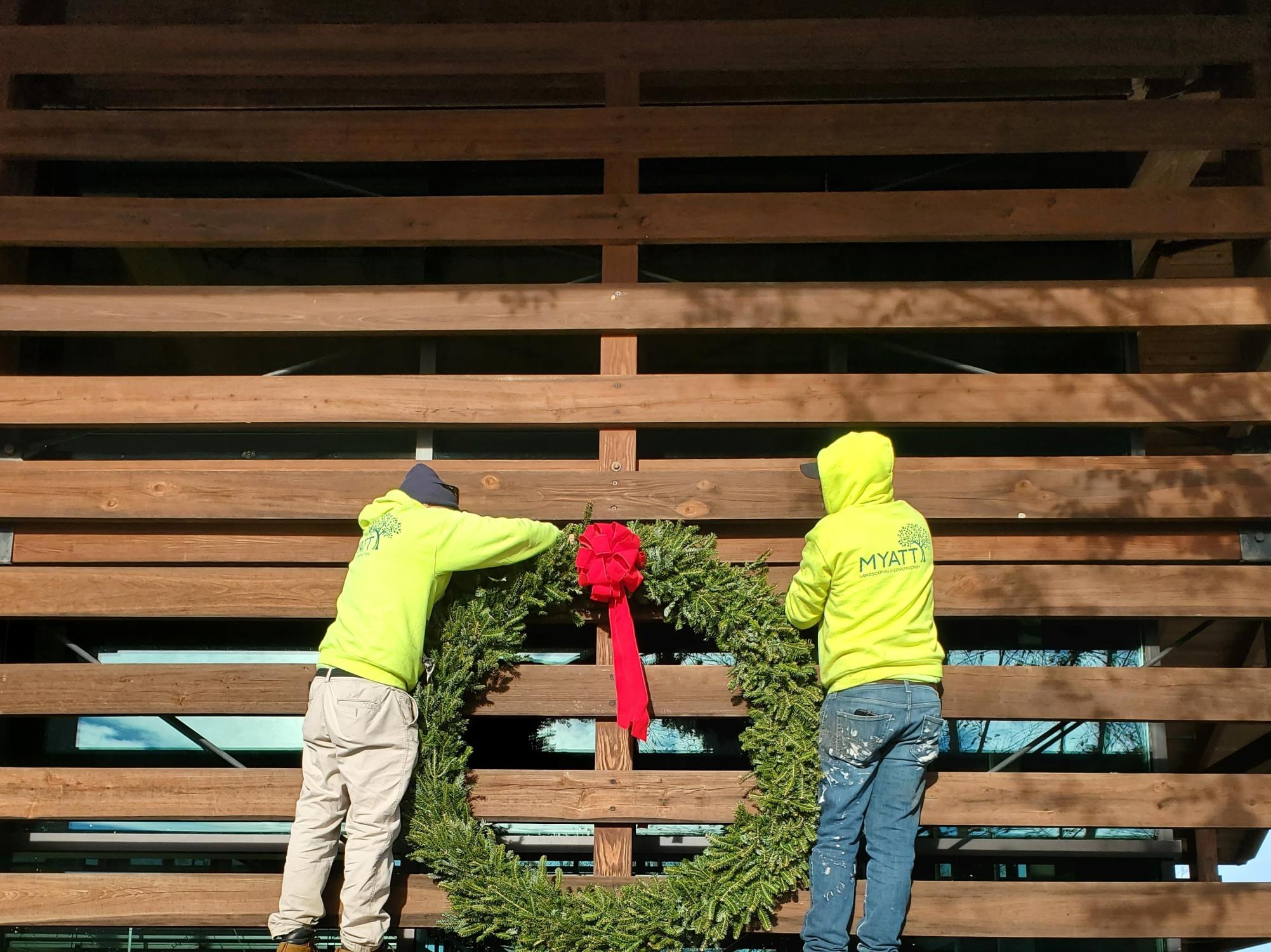 Adding a Christmas Wreath at Wendell Falls