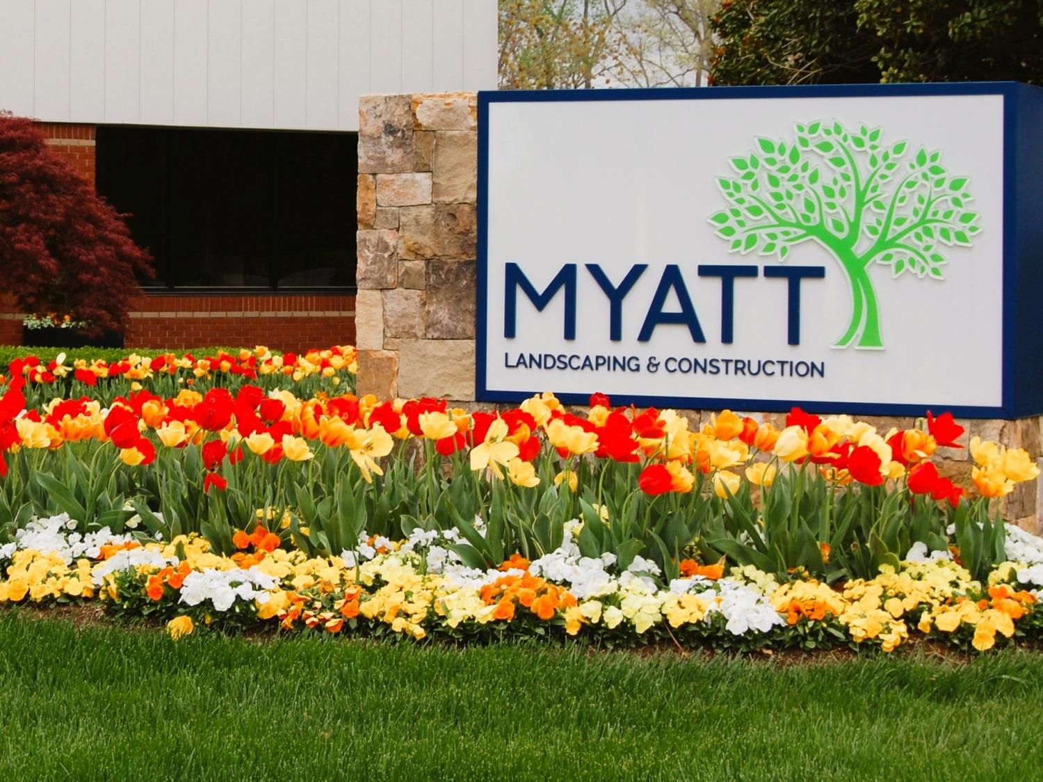 Our front sign with tulips