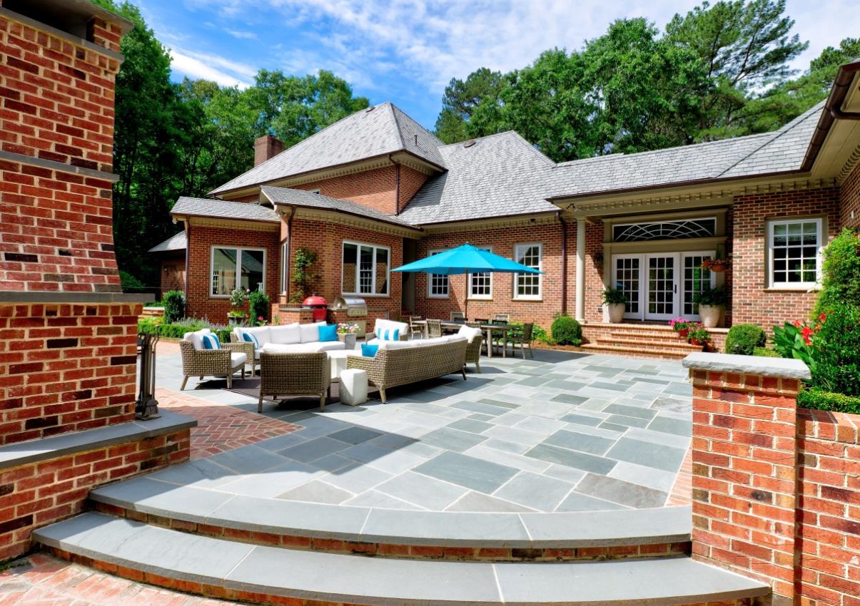 Blue stone patio designed and installed by our team 